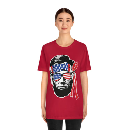 Independence Day Groovy Flag Glasses Well Known Face with Flag Bandana Unisex Jersey Short Sleeve Tee