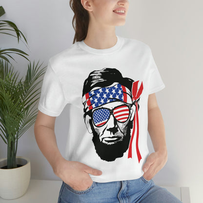 Independence Day Groovy Flag Glasses Well Known Face with Flag Bandana Unisex Jersey Short Sleeve Tee